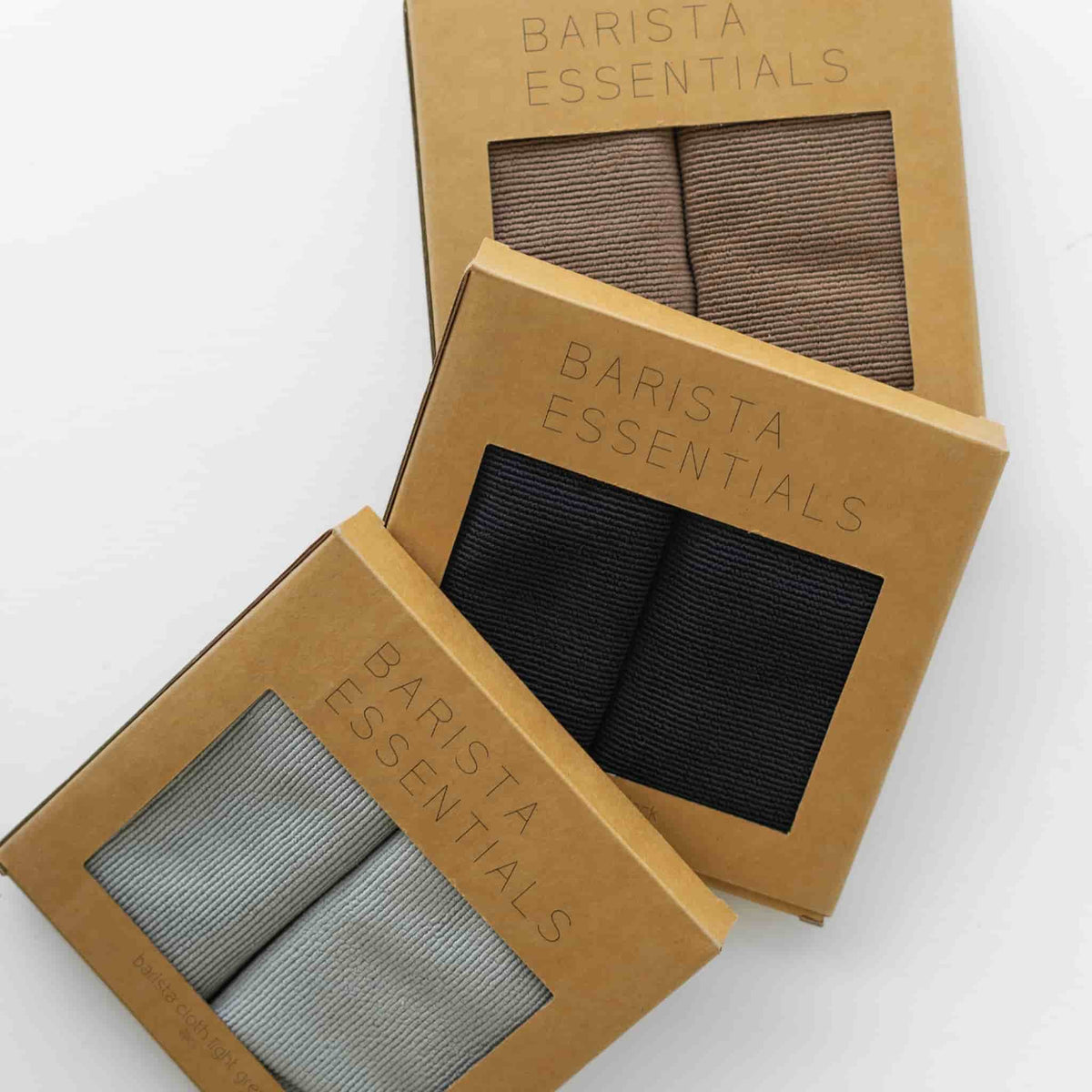 Doeken in verschillende kleuren in kartonnen verpakkingen