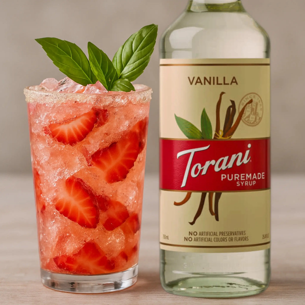 Aardbeien mocktial met fles vanille siroop van Torani