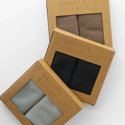 Doekjes in verschillende kleuren in kartonnen verpakkingen