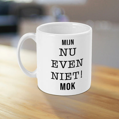 Witte koffiemok met humor, ideaal voor thuiswerken of relaxen